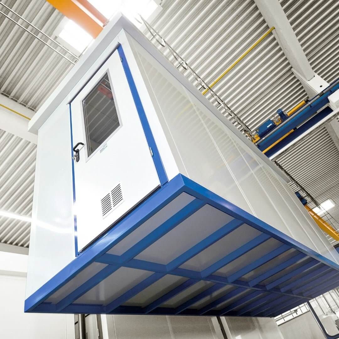 Modulair kantoorunit met hijs oog, ideaal voor eenvoudige verplaatsing en tijdelijke werkruimtes.
